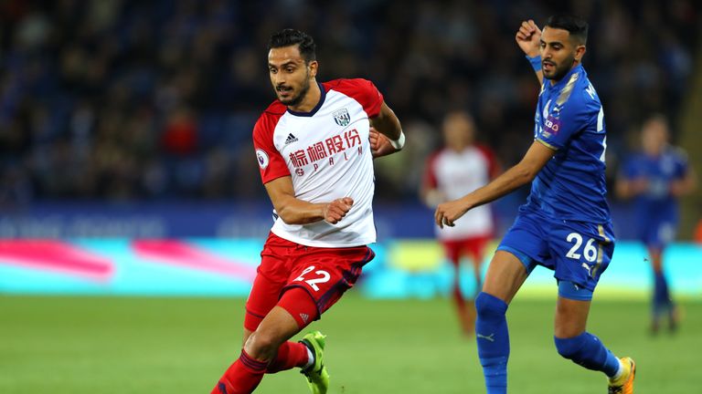 Nacer Chadli of West Bromwich Albion and Riyad Mahrez of Leicester City during the Premier League match