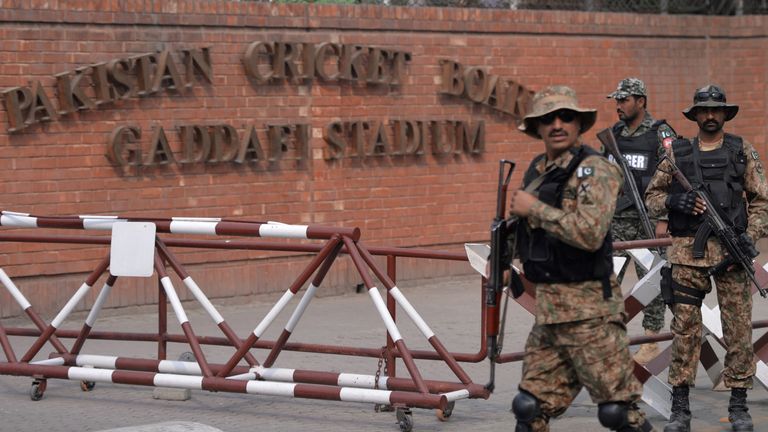 Pakistani soldiers patrol outside the Gaddafi Cricket Stadium ahead of the T20 cricket match against Sri Lanka