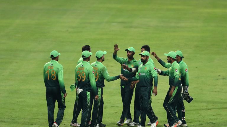 ABU DHABI, UNITED ARAB EMIRATES - OCTOBER 16:  Players of Pakistan celebrate after taking the wicket ofJeffrey Vandersay of Sri Lanka during the second One
