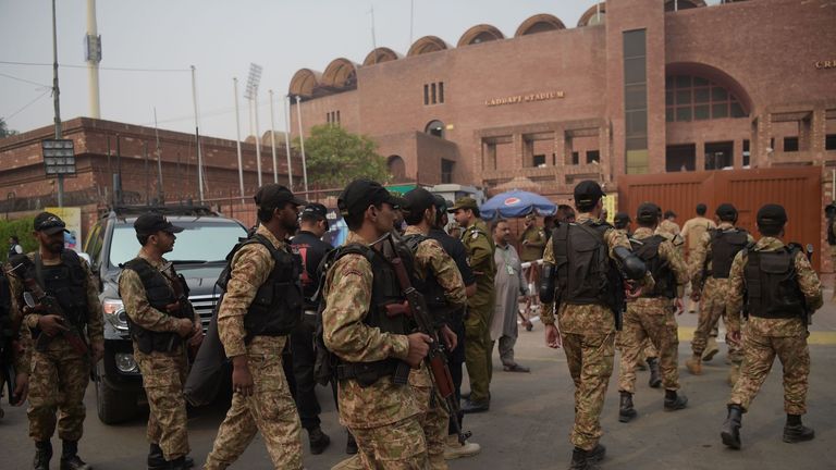 Pakistani soldiers arrive at the Gaddafi Cricket Stadium 