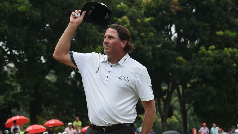 Pat Perez of the US celebrates his win on the last hole during the final round of the 2017 CIMB Classic golf tournament in Kuala Lumpur on October 15, 2017