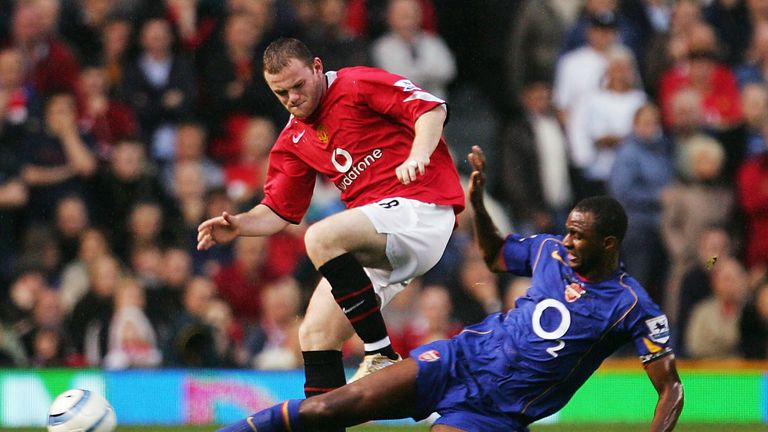 Wayne Rooney of Manchester United battles with Patrick Vieira of Arsenal during the FA Barclays Premiership