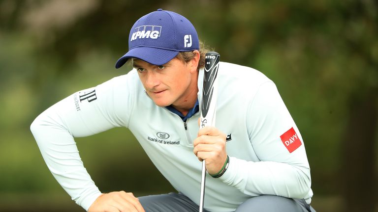 Paul Dunne of Ireland lines up a putt on the 3rd hole during day four of the British Masters at Close House 