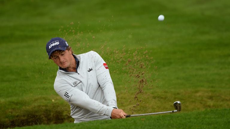 Paul Dunne of Ireland plays he second shot from the sand on the 9th hole during day four of the British Masters