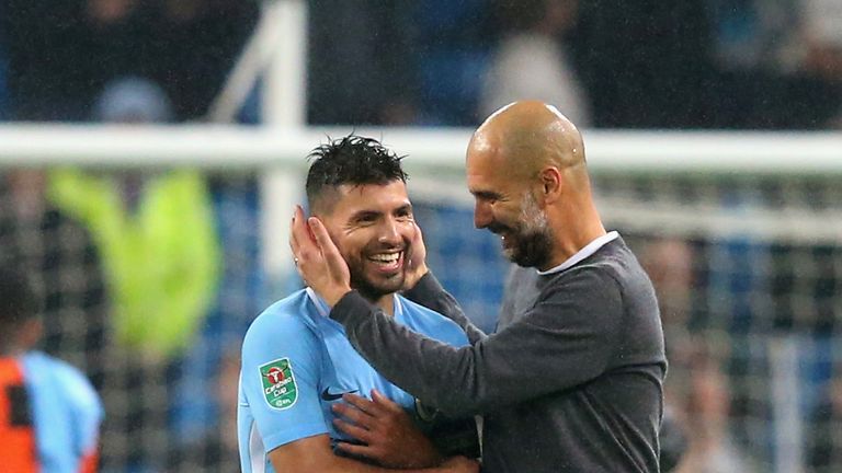 Sergio Aguero and Pep Guardiola celebrate after a nervy finale in the Carabao Cup