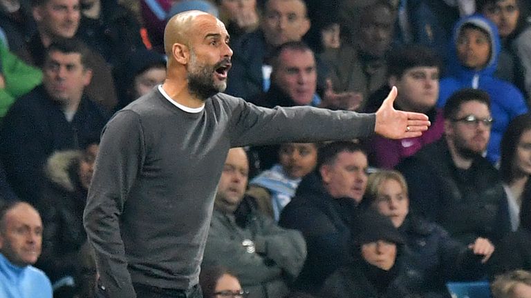 Manchester City's Spanish manager Pep Guardiola gestures on the touchline during the English League Cup fourth round football match between Manchester City