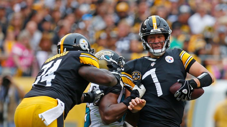 PITTSBURGH, PA - OCTOBER 08: Ben Roethlisberger #7 of the Pittsburgh Steelers is wrapped up for a tackle by Dante Fowler #56 of the Jacksonville Jaguars in