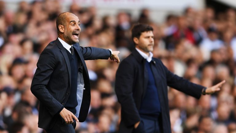 LONDON, ENGLAND - OCTOBER 02:  Josep Guardiola, Manager of Manchester City reacts next to Mauricio Pochettino, manager of Tottenham Hotspur during the Prem