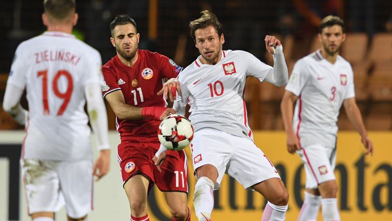 Armenia's midfielder Tigran Barseghyan and Poland's midfielder Grzegorz Krychowiak vie for the ball during the FIFA World Cup 2018 qualification football m