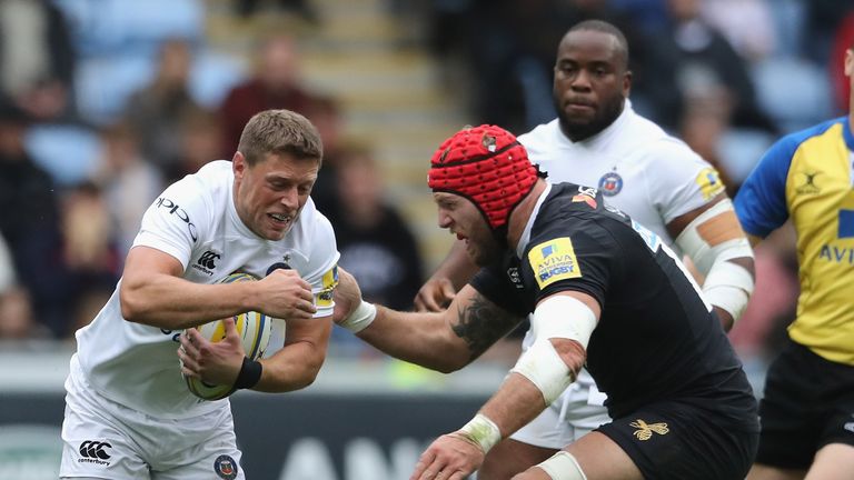  Rhys Priestland  is tackled by James Haskell 