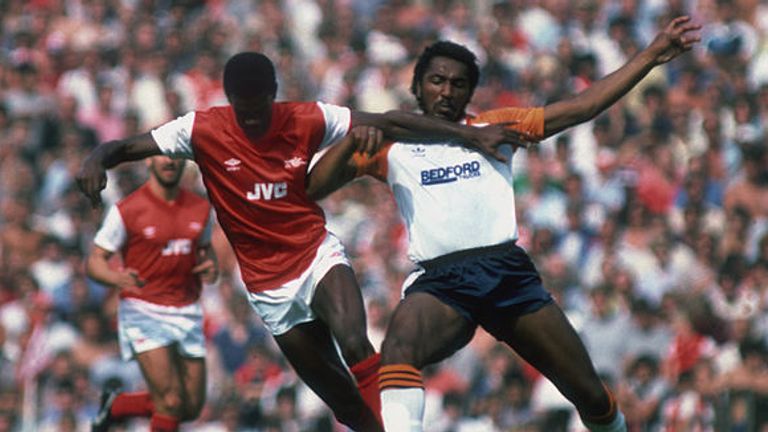 Arsenal's Paul Davis is challenged by Luton's Ricky Hill during the opening match of the 19834-84 season Highbury