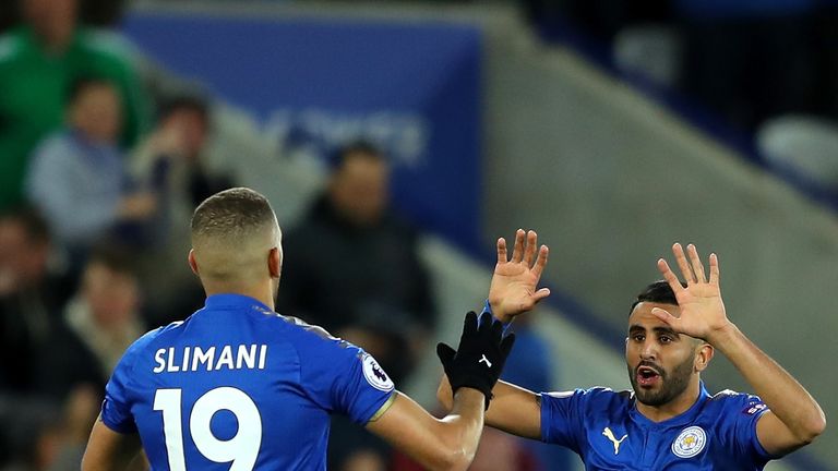 Riyad Mahrez celebrates scoring Leicester's equaliser against West Brom with Islam Slimani 