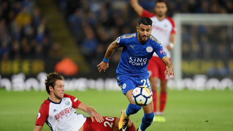 Riyad Mahrez of Leicester City and Grzegorz Krychowiak of West Bromwich Albion in action during the Premier League match 
