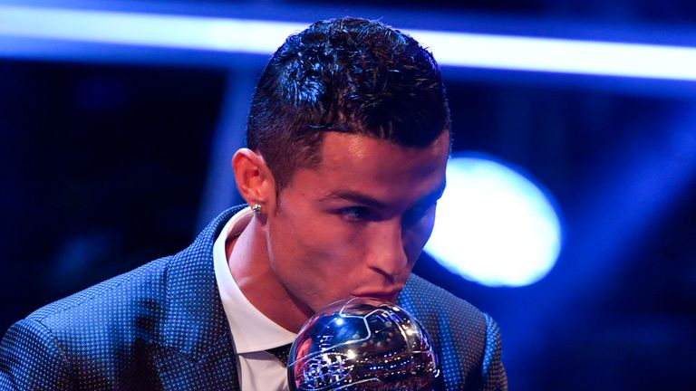 Real Madrid and Portugal forward Cristiano Ronaldo kisses the trophy after winning The Best FIFA Men's Player of 2017 Award during The Best FIFA Football A