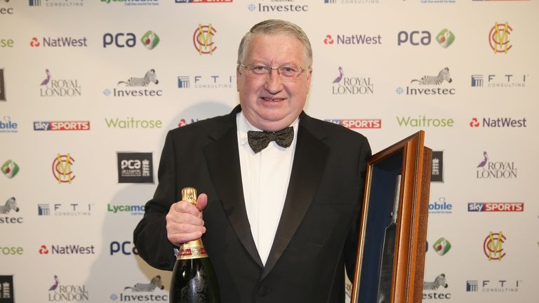 LONDON, ENGLAND - OCTOBER 01:  David Collier poses with the ECB Special Award during the PCA Awards dinner at The Old Billingsgate on October 1, 2014 in Lo