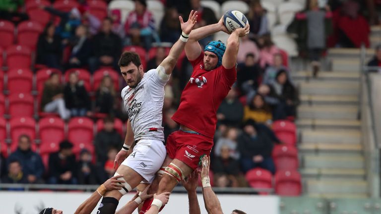 Scarlets' Irish lock Tadhg Beirne (up right) wins the ball against Toulon