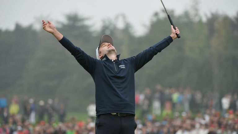 SHANGHAI, CHINA - NOVEMBER 08:  Russell Knox of Scotland celebrates winning the tournament on the 18th hole during the final round of the WGC - HSBC Champi