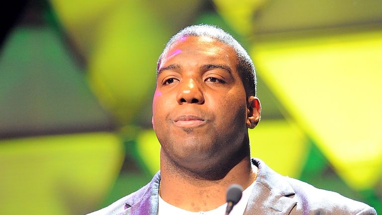 TEMPE, AZ - JANUARY 30:  NFL player Russell Okung speaks onstage during the 16th Annual Super Bowl Gospel Celebration at ASU Gammage on January 30, 2015 in