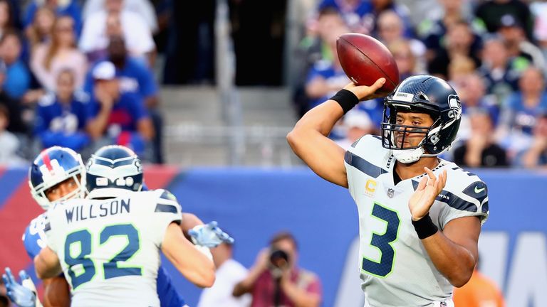 EAST RUTHERFORD, NJ - OCTOBER 22:  Quarterback  Russell Wilson #3 of the Seattle Seahawks throws a pass against the New York Giants during the first quarte