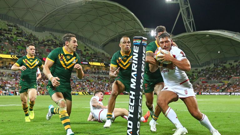MELBOURNE, AUSTRALIA - OCTOBER 27:  Billy Slater and Dane Gagai of the Kangaroos perform a try saving tackle as Ryan Hall of England attempts to score a  t