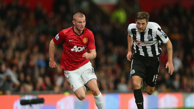 MANCHESTER, ENGLAND - SEPTEMBER 26:  Ryan Tunnicliffe of Manchester United beats Dan Gosling of Newcastle United during the Capital One Cup Third Round mat