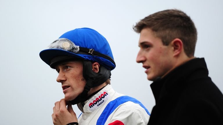 EXETER, UNITED KINGDOM - DECEMBER 15: Jockey Sam Twiston Davies and Assistant to Paul Nicholas Yard Harry Derham(R) look on at Exeter Racecourse on Decembe