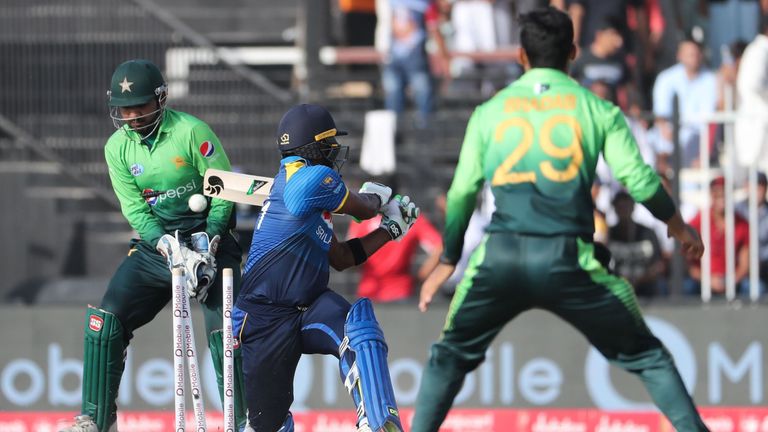 Seekkuge Prasanna (C) of Sri Lanka bats during the third one day international (ODI) cricket match between Sri Lanka and Pakistan at Sharjah Cricket Stadiu