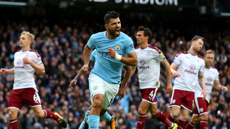 Sergio Aguero of Manchester City celebrates as he scores their first goal from the penalty spot during the Premier League match