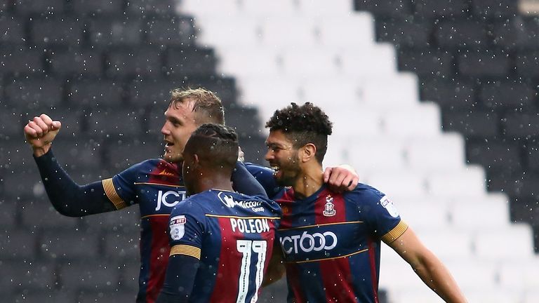 MILTON KEYNES, ENGLAND - OCTOBER 07:  Charlie Wyke of Bradford City celebrates scoring his side's third goal with teammates during the Sky Bet League One m
