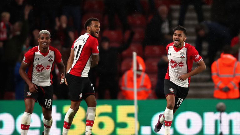 SOUTHAMPTON, ENGLAND - OCTOBER 21:  Sofiane Boufal of Southampton celebrates with teammates after scoring his sides first goal during the Premier League ma