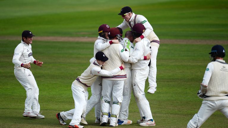 TAUNTON, ENGLAND - SEPTEMBER 28: The Somerset side celebrate the wicket of Steven Finn of Middlesex meaning that they avoid relegation during Day Four of t