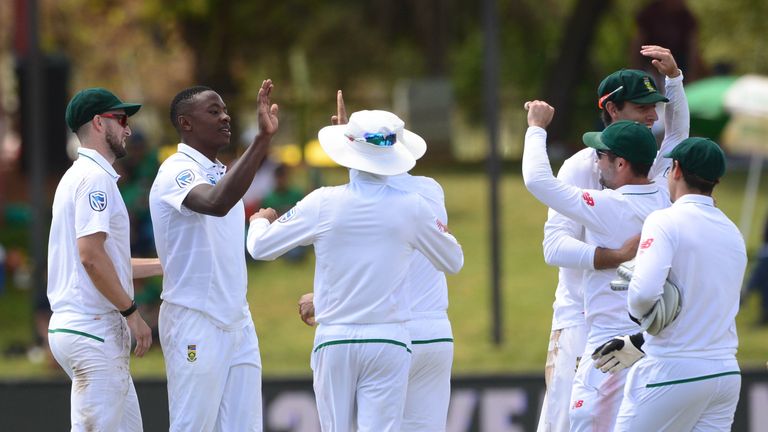 BLOEMFONTEIN, SOUTH AFRICA - OCTOBER 08: Kagiso Rabada of the Proteas celebrates his 100 test wicket of Mahmudullah of Bangladesh with his team mates durin