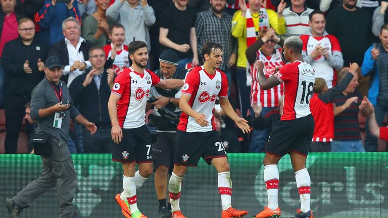 SOUTHAMPTON, ENGLAND - OCTOBER 15:  Manolo Gabbiadini of Southampton (C) celebrates as he scores their second goal from the penalty spot with Shane Long an