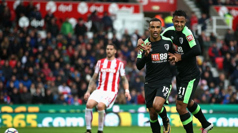 STOKE ON TRENT, ENGLAND - OCTOBER 21:  Junior Stanislas of AFC Bournemouth celebrates scoring the 2nd Bournemouth goal with Lys Mousset of AFC Bournemouth 