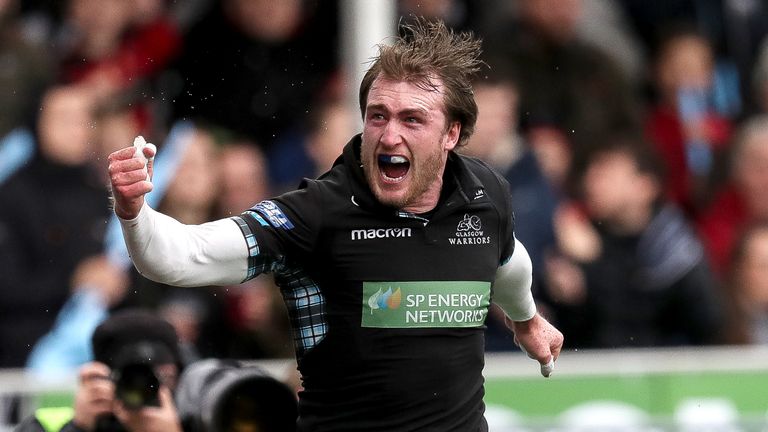 Glasgow's Stuart Hogg celebrates scoring his sides first try.