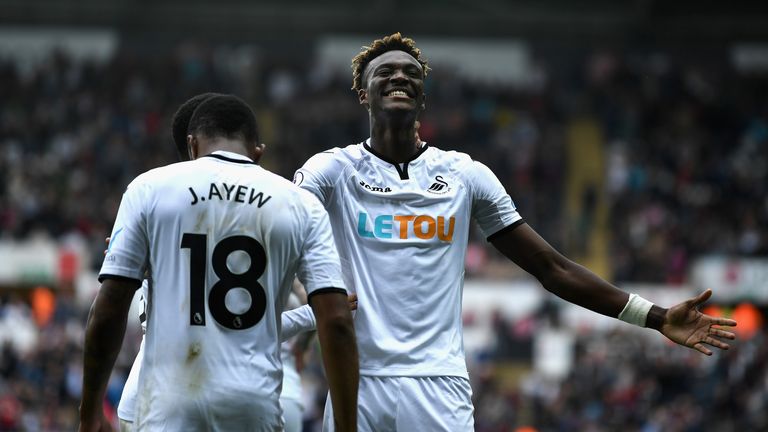 SWANSEA, WALES - OCTOBER 14:  Tammy Abraham of Swansea City celebrates scoring his sides first goal during the Premier League match between Swansea City an