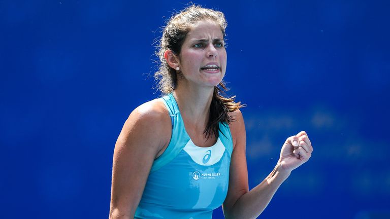WUHAN, CHINA - SEPTEMBER 26:  Julia Goerges of Germany reacts during the second round Ladies Singles match against Agnieszka Radwanska of Poland on Day 3 o