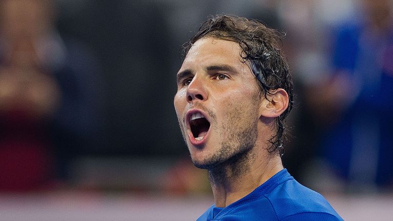 Rafael Nadal of Spain celebrates winning the men's singles final match against Nick Kyrgios of Australia at the China Open tennis tournament in Beijing