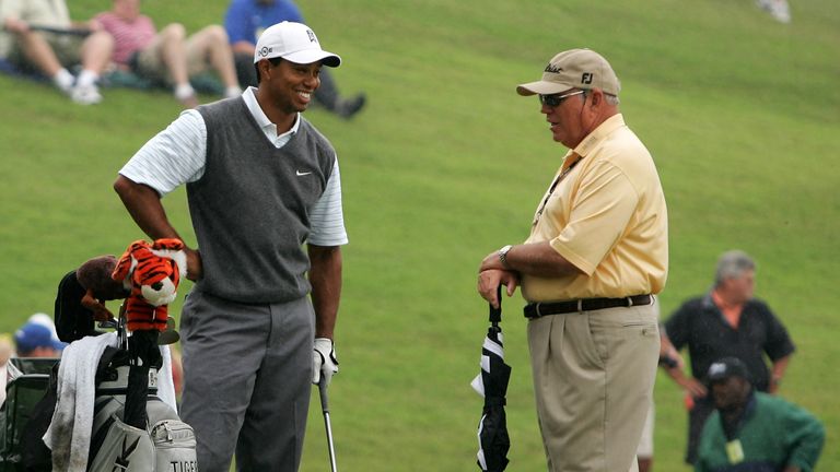 PONTE VEDRA BEACH, FL - MAY 09:  Tiger Woods of the USA talks with former coach Butch Harmon during the practice round for THE PLAYERS Championship on The 