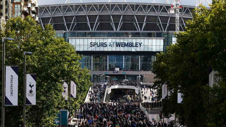 LONDON, ENGLAND - SEPTEMBER 16, 2017: Fans make their way prior to the Premier League match between Tottenham Hotspur and Swansea City at Wembley.