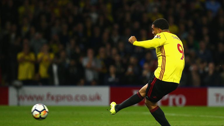 WATFORD, ENGLAND - OCTOBER 14:  Troy Deeney of Watford scores their first and equalising goal from the penalty spot during the Premier League match between