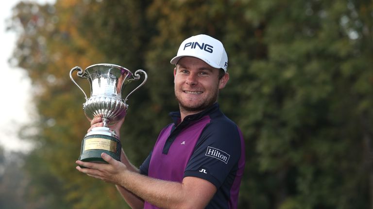 MONZA, ITALY - OCTOBER 15:  Tyrrell Hatton of England poses for the cameras with the Italian Open trophy during Day Four of the Italian Open at Golf Club M