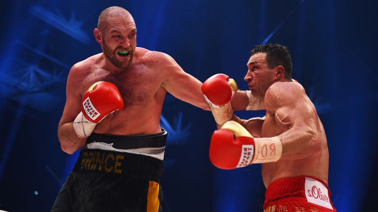 Tyson Fury in action with Wladimir Klitschko during the IBF IBO WBA WBO Heavyweight World Championship contest.