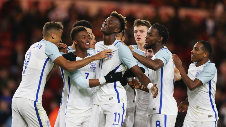 MIDDLESBROUGH, ENGLAND - OCTOBER 06:  Tammy Abraham of England (11) celebrates as he scores their second goal from a penalty with team mates during the UEF