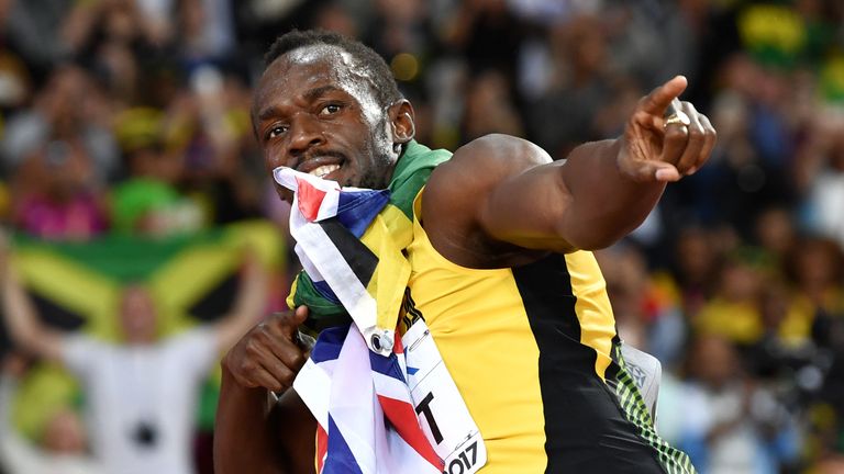 TOPSHOT - Jamaica's Usain Bolt poses after taking third in the final of the men's 100m athletics event at the 2017 IAAF World Championships at the London S