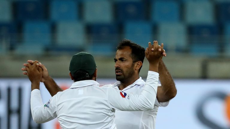 DUBAI, UNITED ARAB EMIRATES - OCTOBER 08:  Wahab Riaz of Pakistan celebrate  after dismissing Dinesh Chandimal of Sri Lanka during Day Three of the Second 