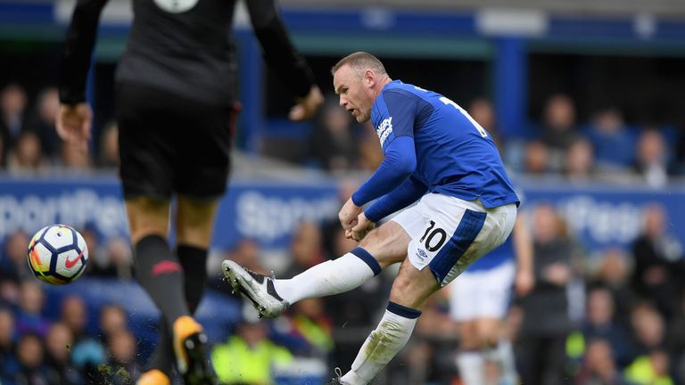 LIVERPOOL, ENGLAND - OCTOBER 22: Wayne Rooney of Everton scores his sides first goal during the Premier League match between Everton and Arsenal at Goodiso