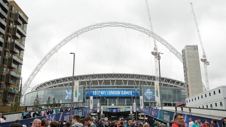 LONDON, ENGLAND - OCTOBER 01: Fans arrive at the stadium prior to kickoff  the NFL game between the Miami Dolphins and the New Orleans Saints at Wembley St