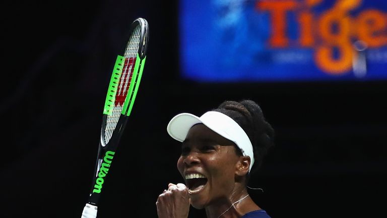 SINGAPORE - OCTOBER 26:  Venus Williams of the United States celebrates victory in her singles match against Garbine Muguruza of Spain during day 5 of the 