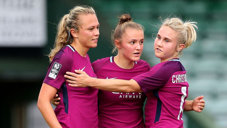 Manchester City's Geogria Stanway (centre) celebrates scoring her sides fourth goal with Claire Emslie and Isobel Christiansen during the FA Women's Super 